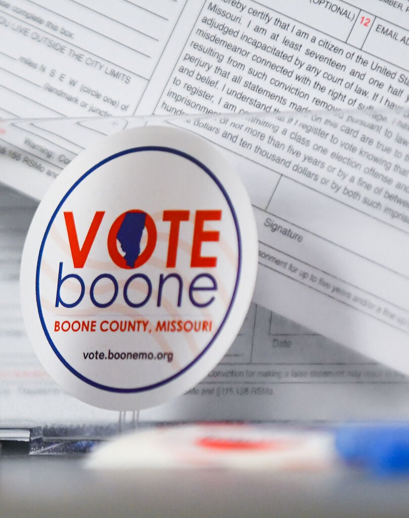 A sticker that reads "Vote Boone" is among tools and forms